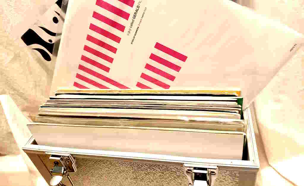 a crate of vinyl records